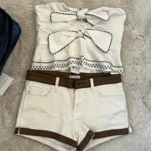 white tube top and shorts set